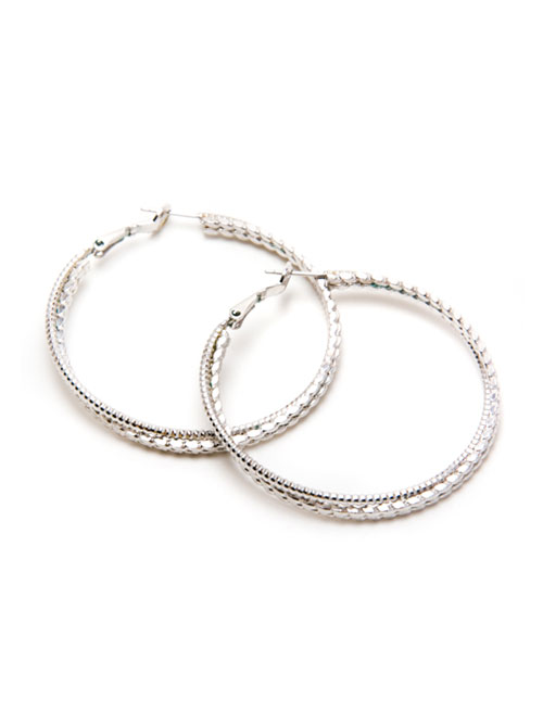 A wardrobe essential that's far from basic. The stylish Hilda Hoops will complement any outfit. Crafted in a white gold finish.