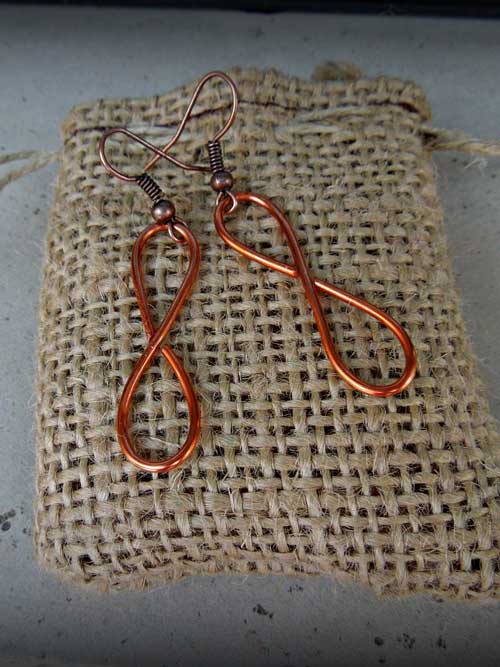 infinity copper earrings for alma and co